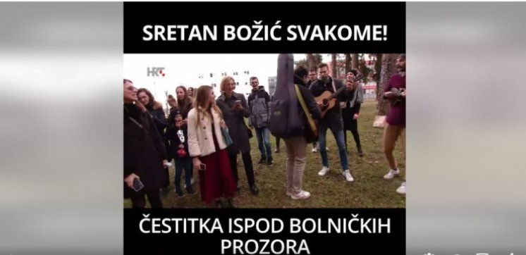 VIDEO Mladi se okupili ispred KBC-a Zagreb i zapjevali božićne pjesme pacijentima